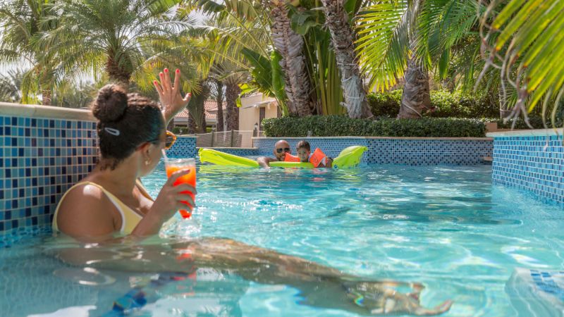 Family playing in a Pool
