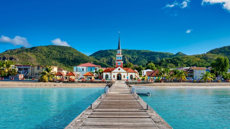 Pontoon and church in Anse dArlet Martinique