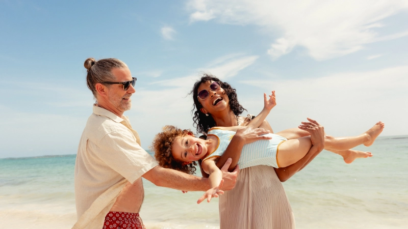 Family on the beach at Paradisus Playa del Carmen