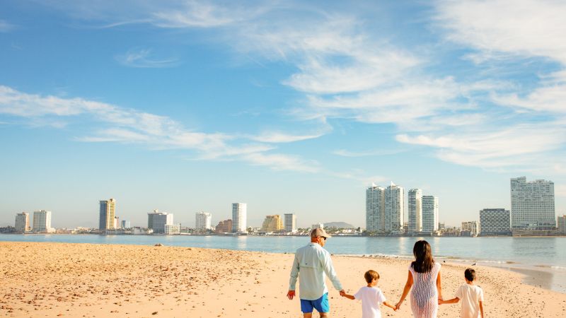 Family on the beach in Mazatlan
