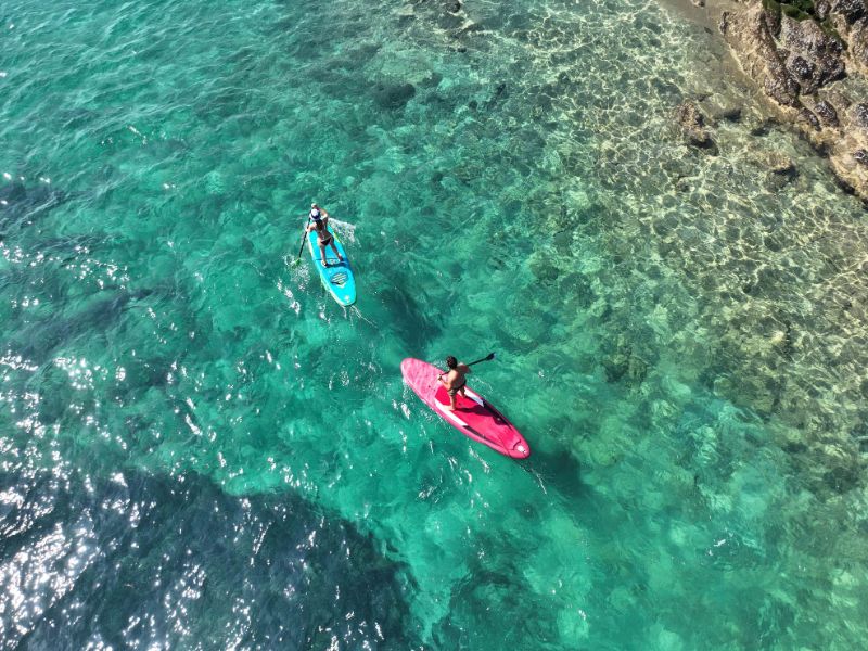 two people on paddleboards