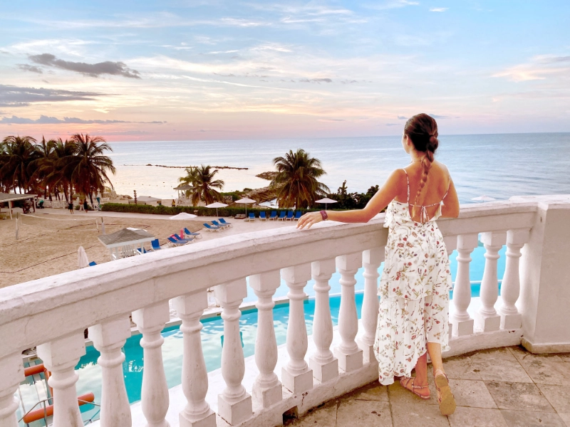 Lady looking at sunset in Grand Palladium Jamaica Resort   Spa
