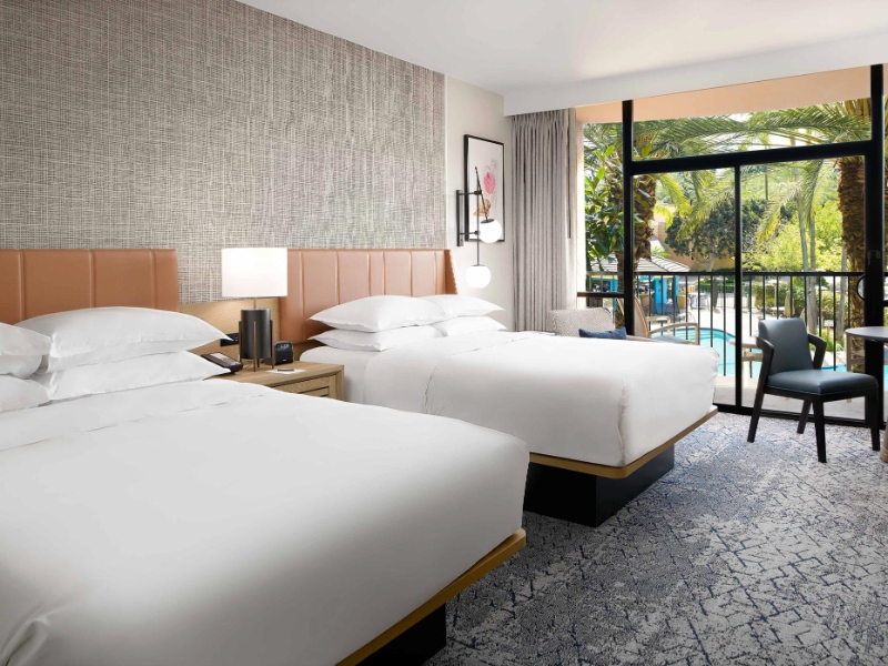 Double Queen Balcony Pool View