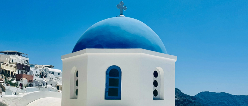 View of Oia with a blue dome